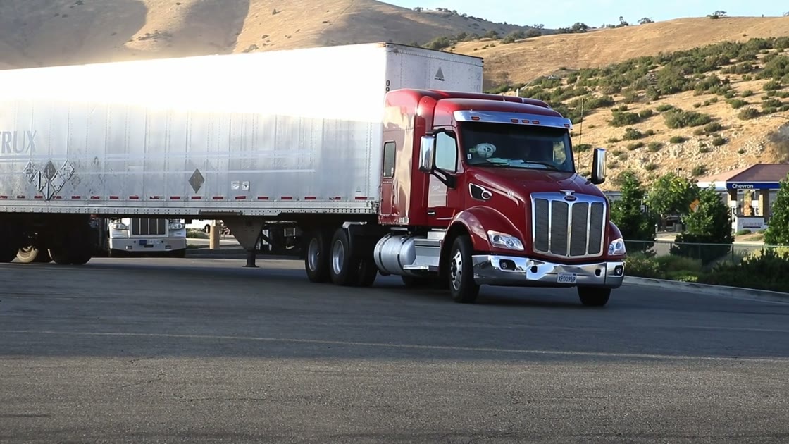 Eco Logistics semi-truck carrying a regional load